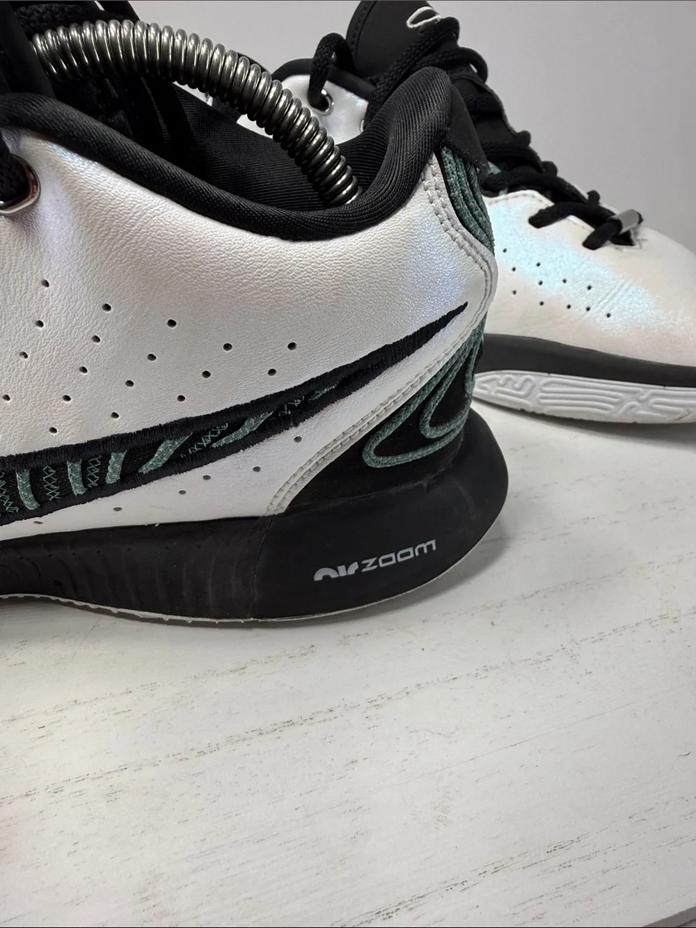Nike Men’s White and Black Low-Top Sneakers with Subtle Iridescent Sheen